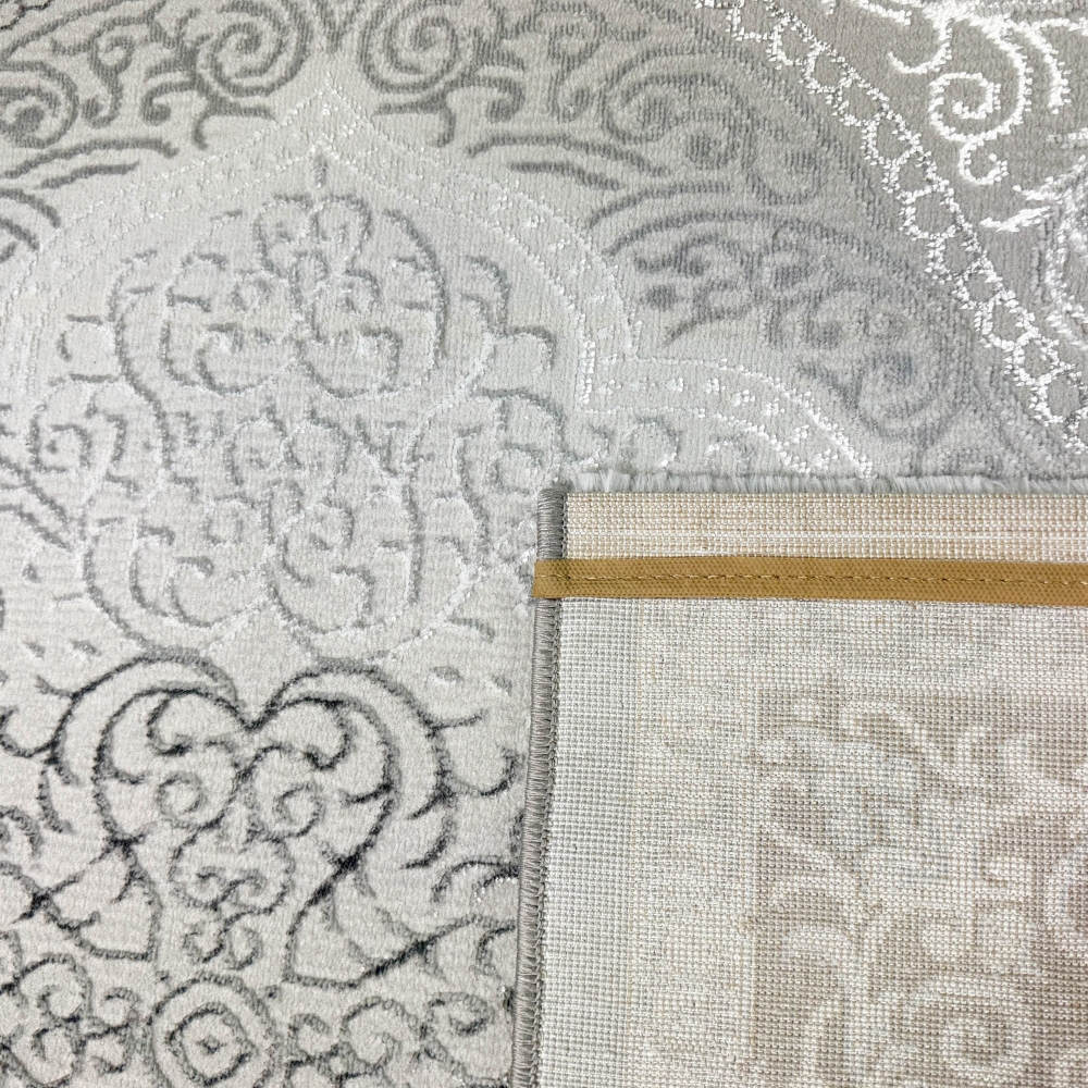 Orientteppich mit Verzierungen glänzend silber grau-beige